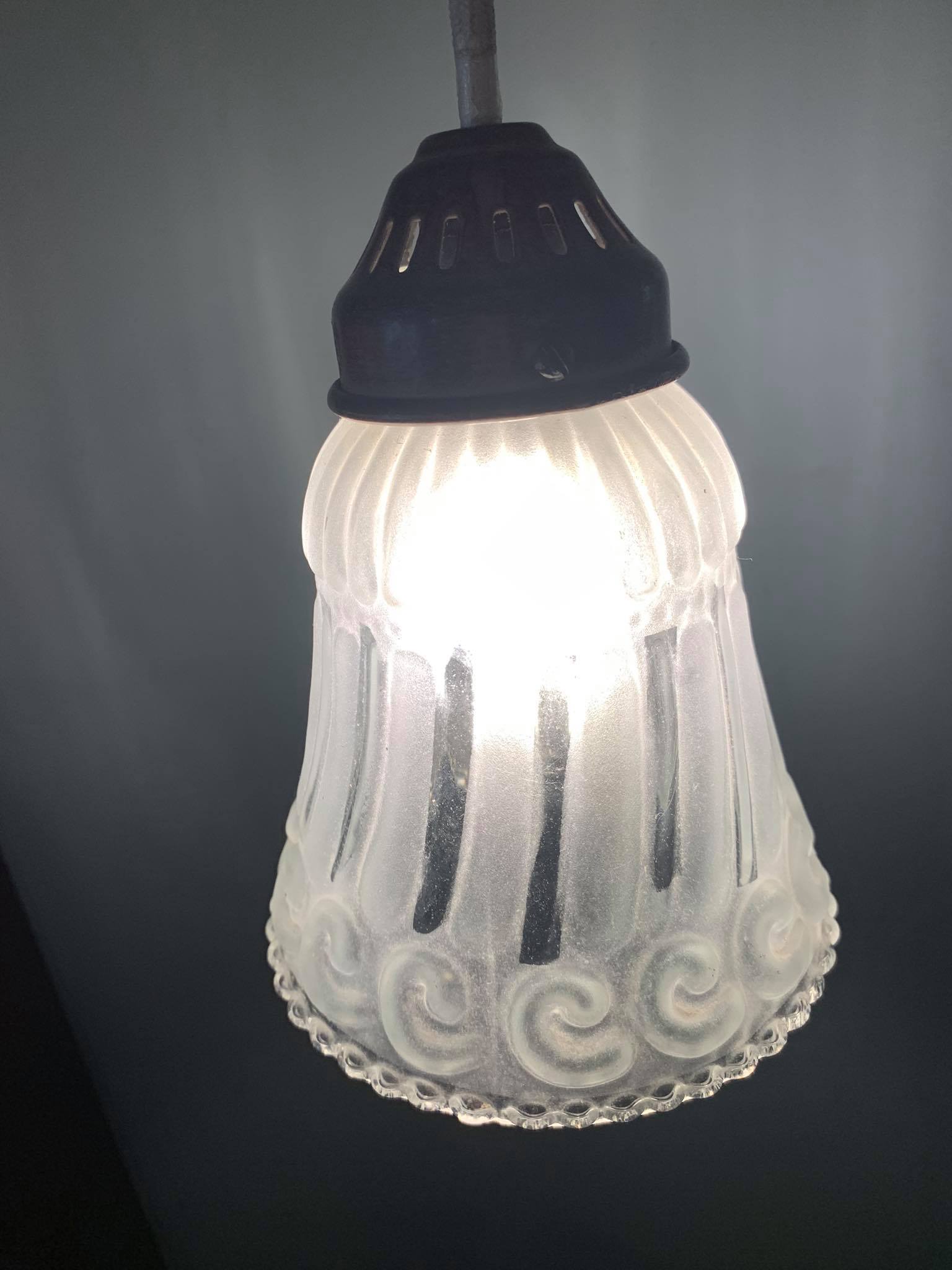 Frosted pressed molded glass suspension