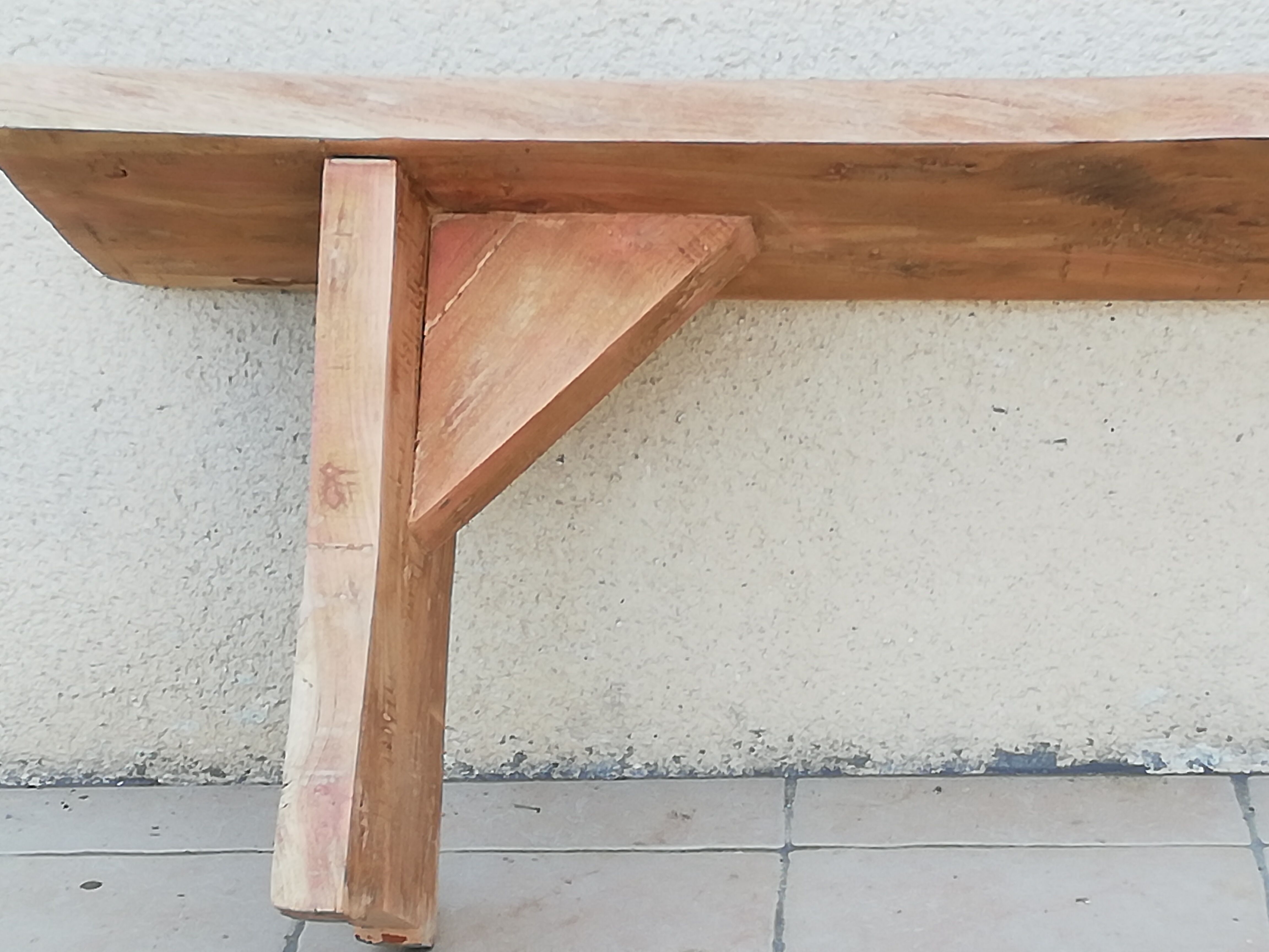 Old country bench in solid wood