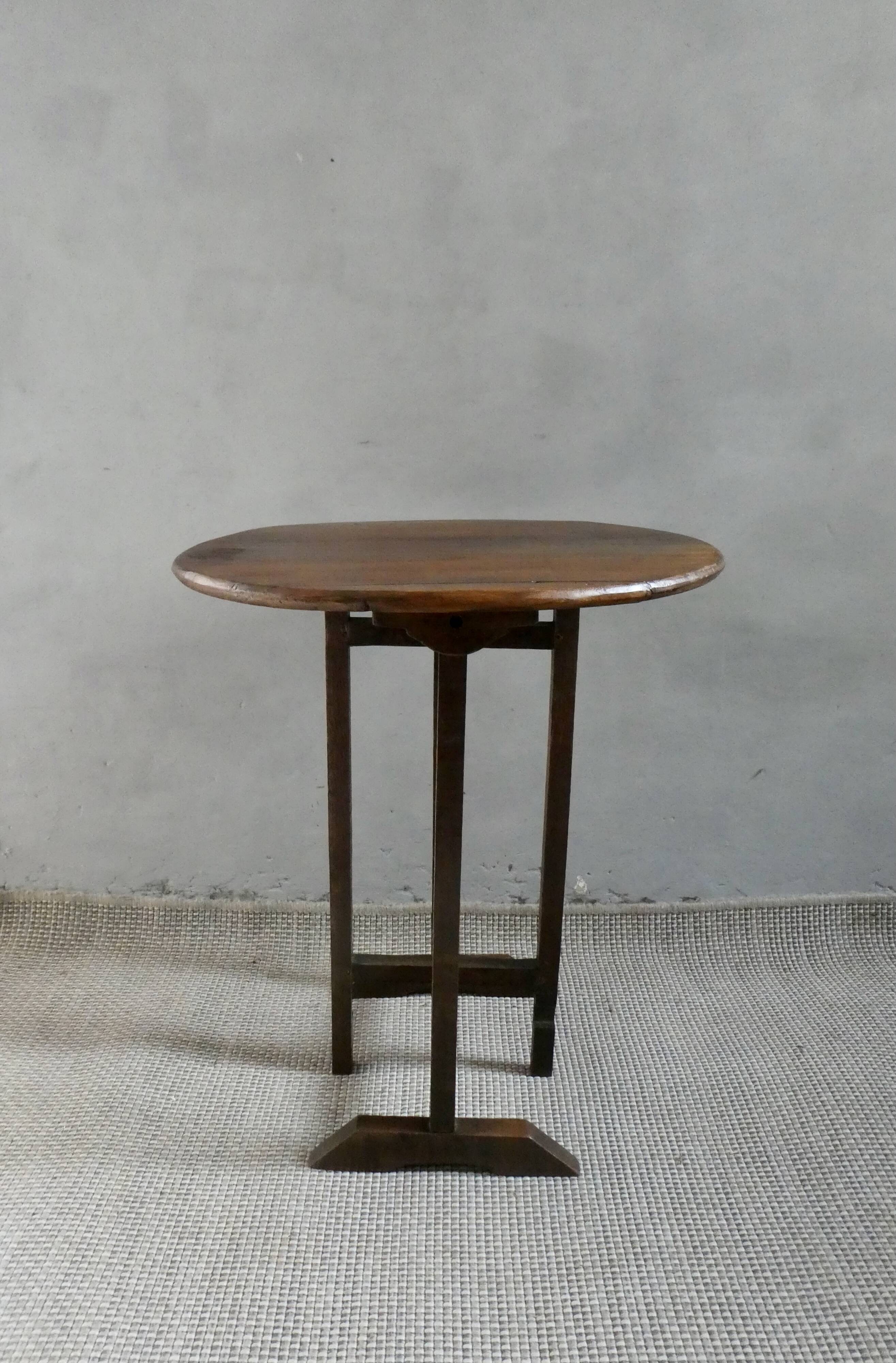 Small table known as a winemaker's table.