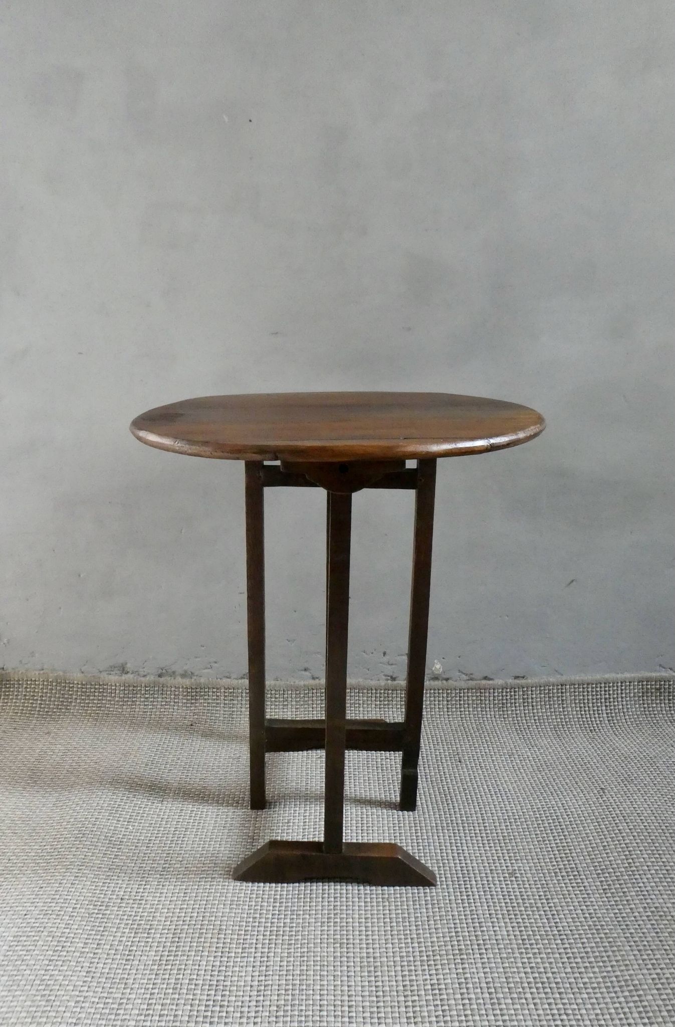 Small table known as a winemaker's table.