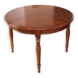 Round cherry wood table with extensions