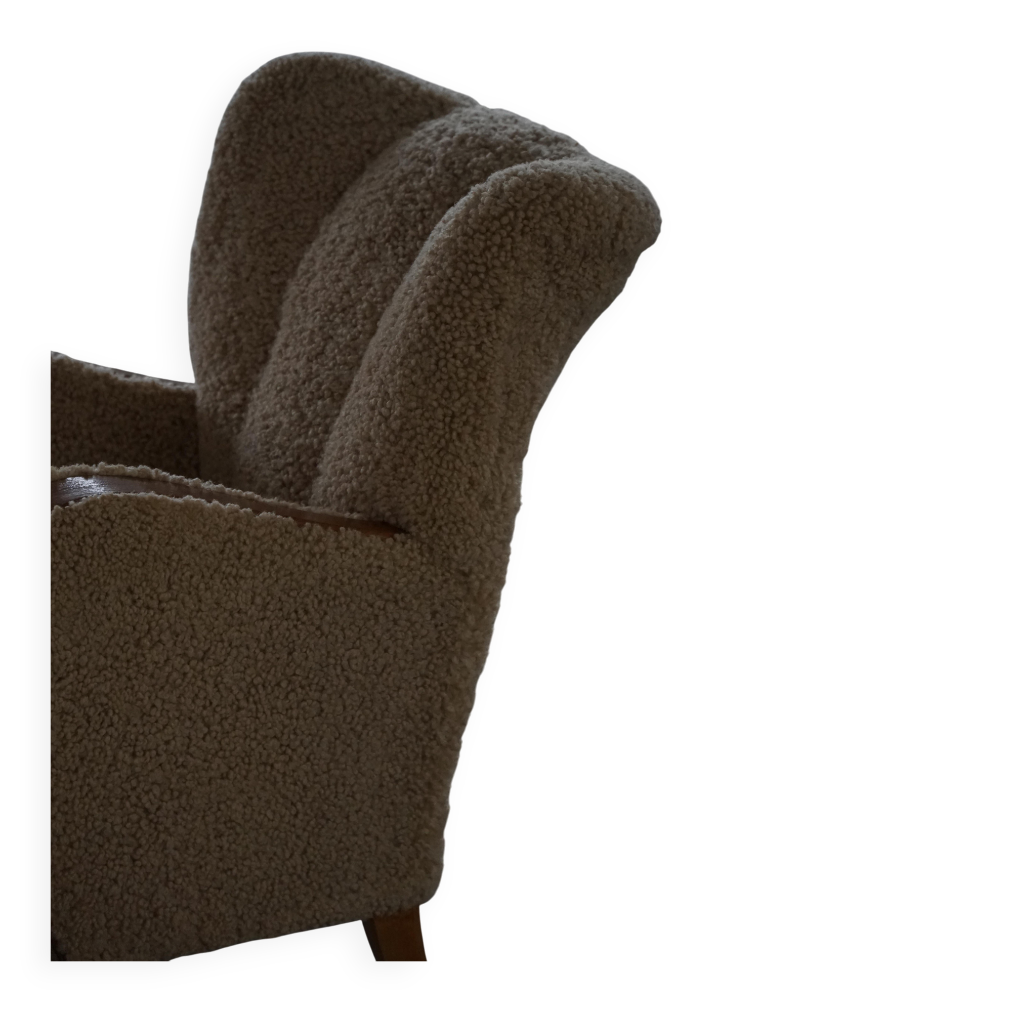 Pair of Danish Art Deco modern lounge chairs in sheepskin with lambswool and elm, 1940s.