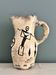 Enamelled ceramic pitcher with rock decoration