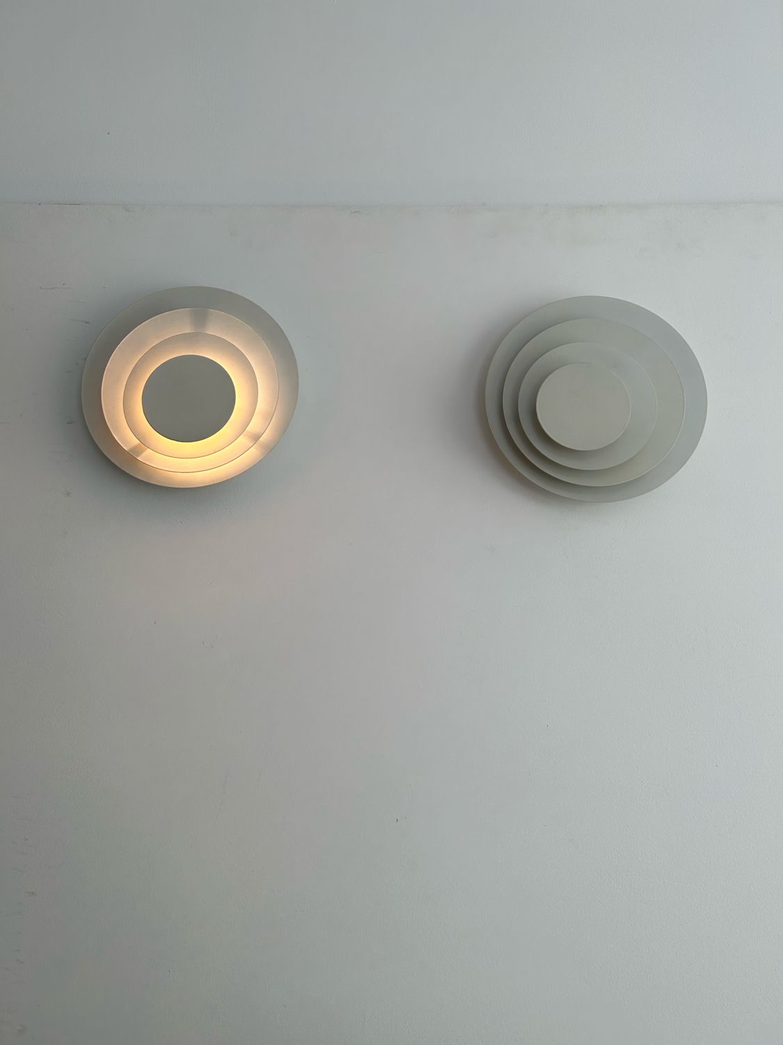 Pair of geometric vintage wall lamps, white lacquered metal, Germany 1970