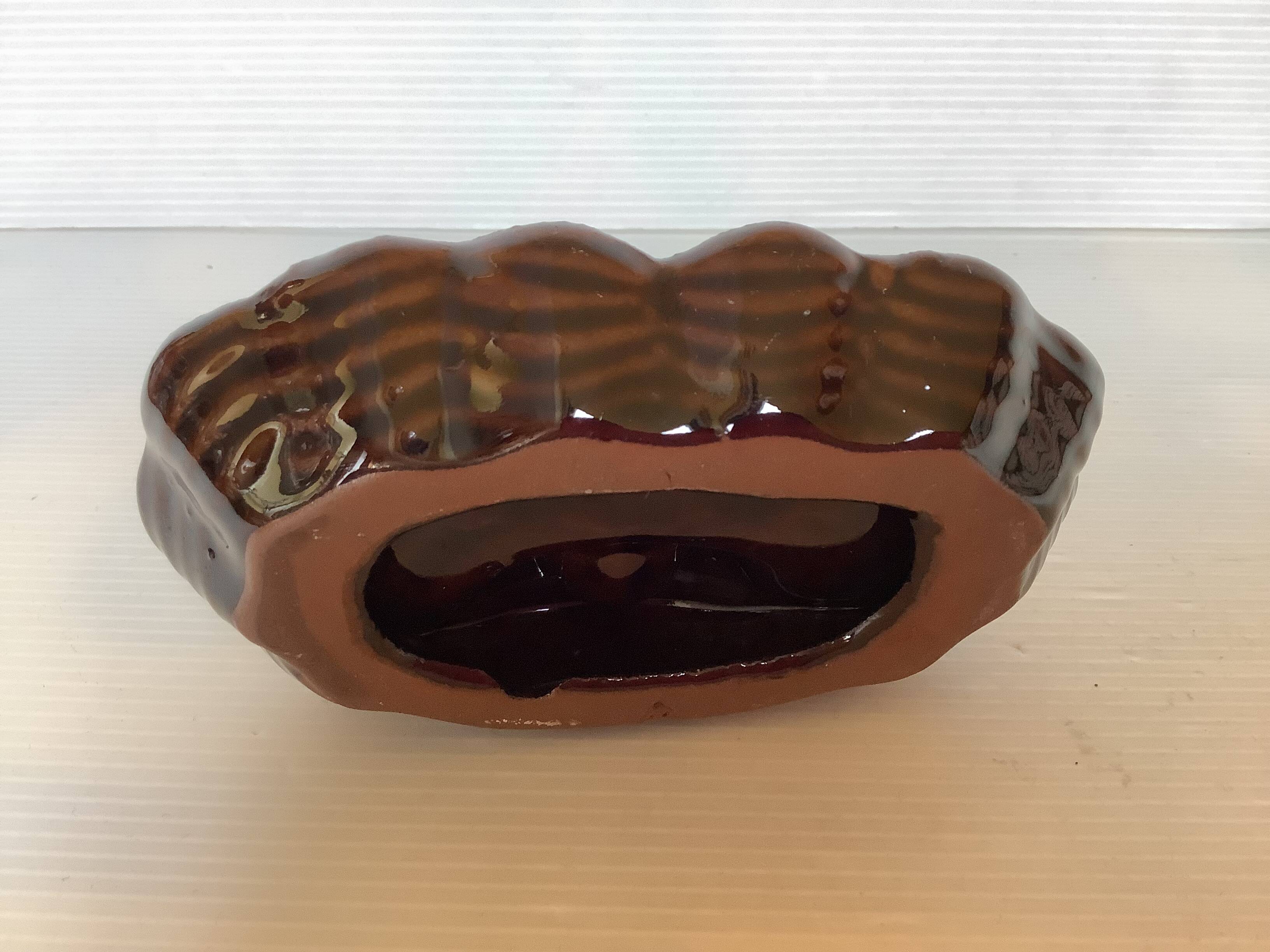 Whale-shaped pocket ashtray