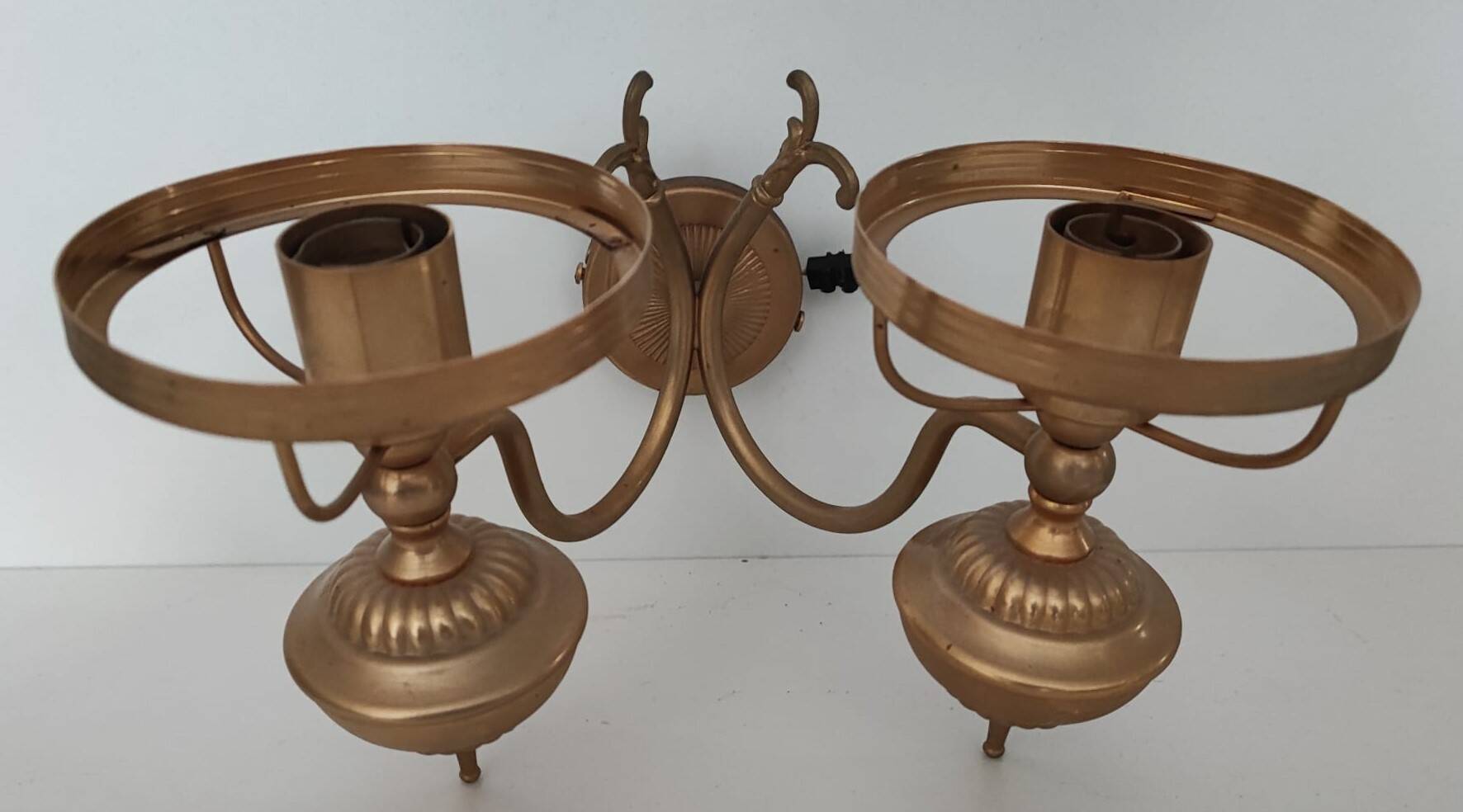 Antique brass wall sconce with two arms, Louis XV style.