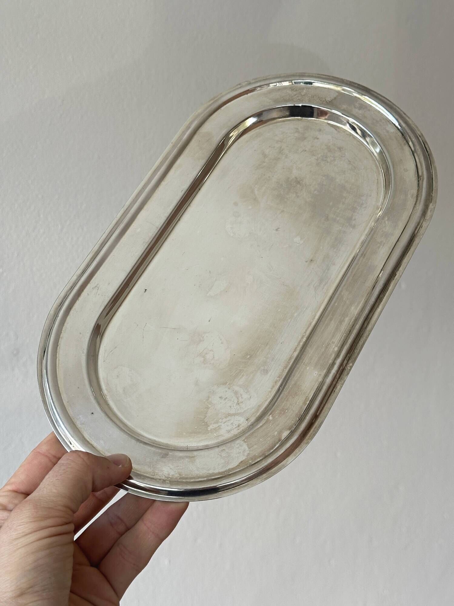 Set of 3 silver-plated trays with a very patinated finish.