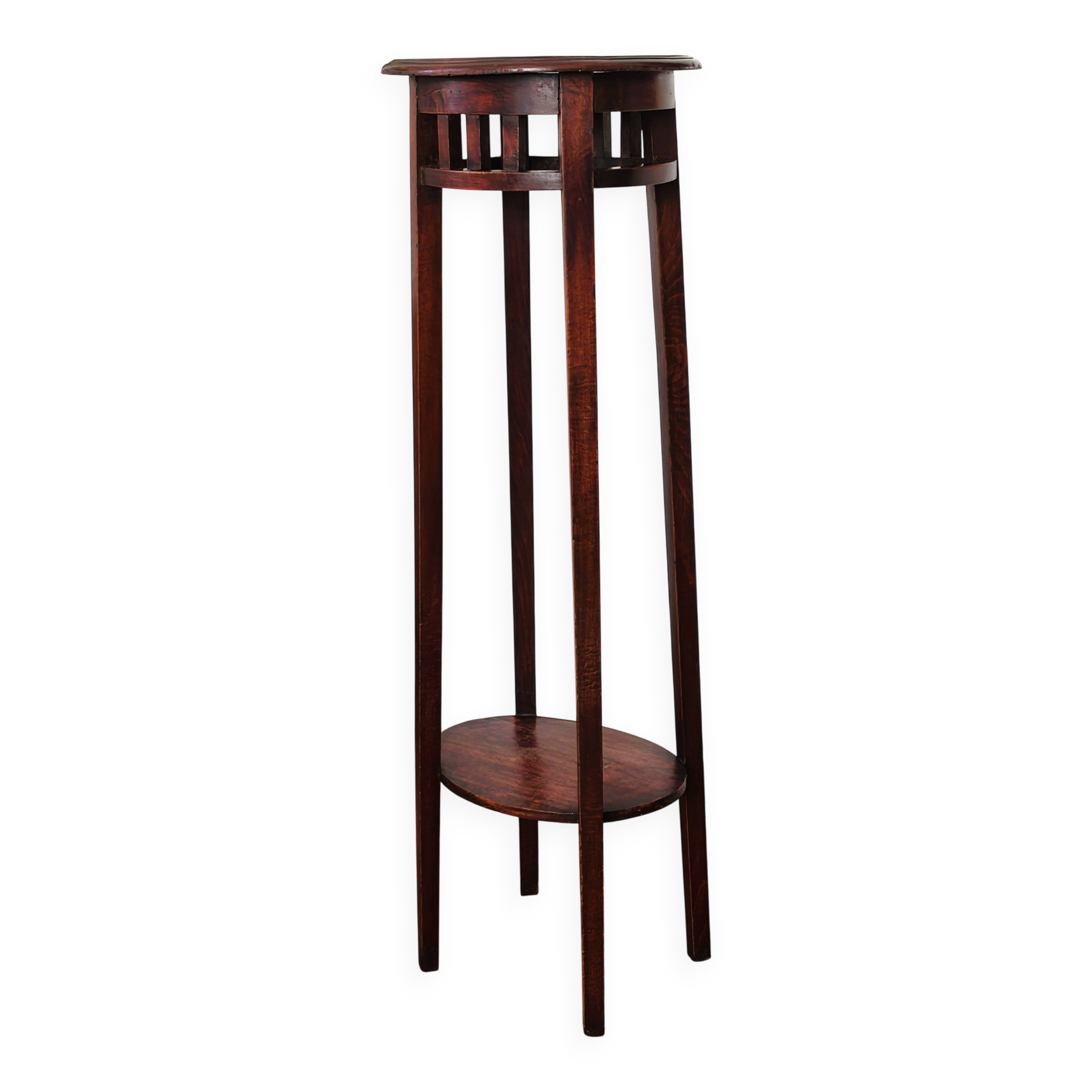 Antique high wooden pedestal with mahogany patina, circa 1900-1925.