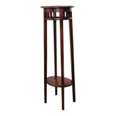 Antique high wooden pedestal with mahogany patina, circa 1900-1925.
