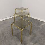 Brass and smoked glass nesting tables, 1970s