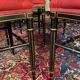 Set of four Napoleon III chairs in black lacquered wood with gold highlights.