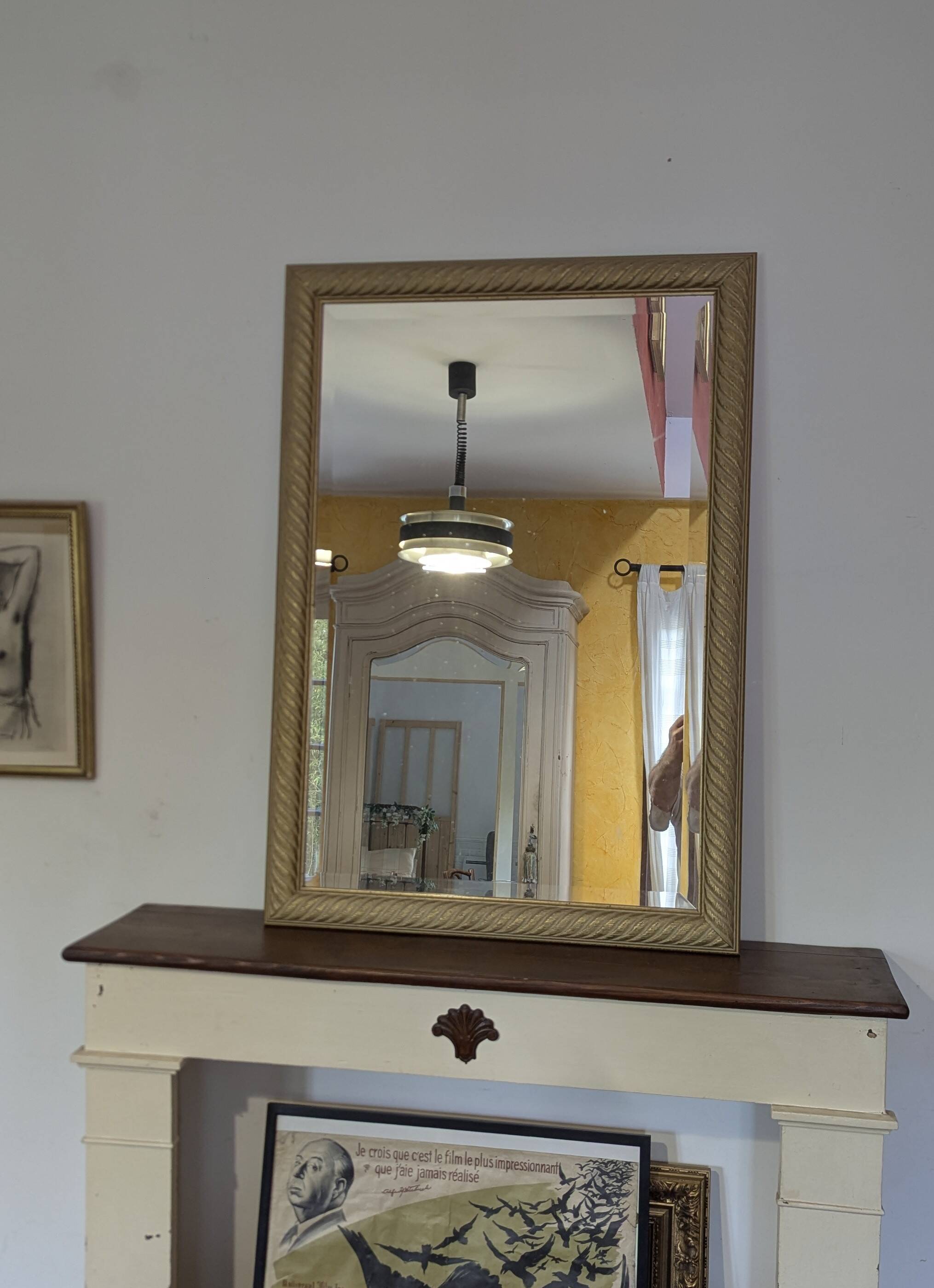 Gold beveled glass trumeau mirror