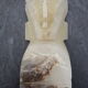 Onyx book clambands depicting an Aztec statue