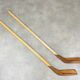 Pair of vintage wood hockey sticks