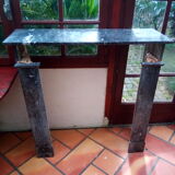 White veined black marble fireplace