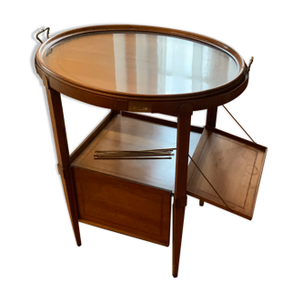Table à thé en bois avec plateau en verre et quatre panneaux repliables