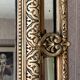 Miroir antique doré à parclose aux dragons, 119x75 cm