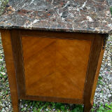 Transitional Louis XV - Louis XVI commode from the 19th century.