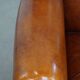 Sheepskin wingback armchair with stitching and black piping