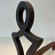 Pair of Cast Iron Chenets with Figurative Anthropomorphic Silhouette, by Raymon