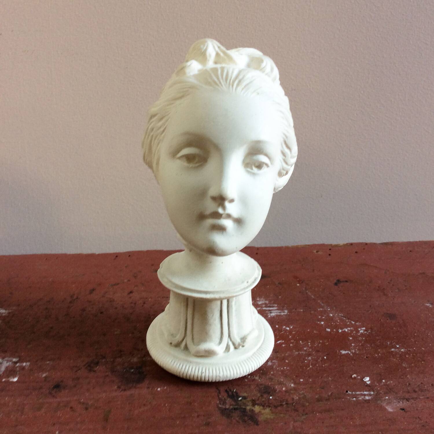 Plaster sculpture young woman with headband 1910