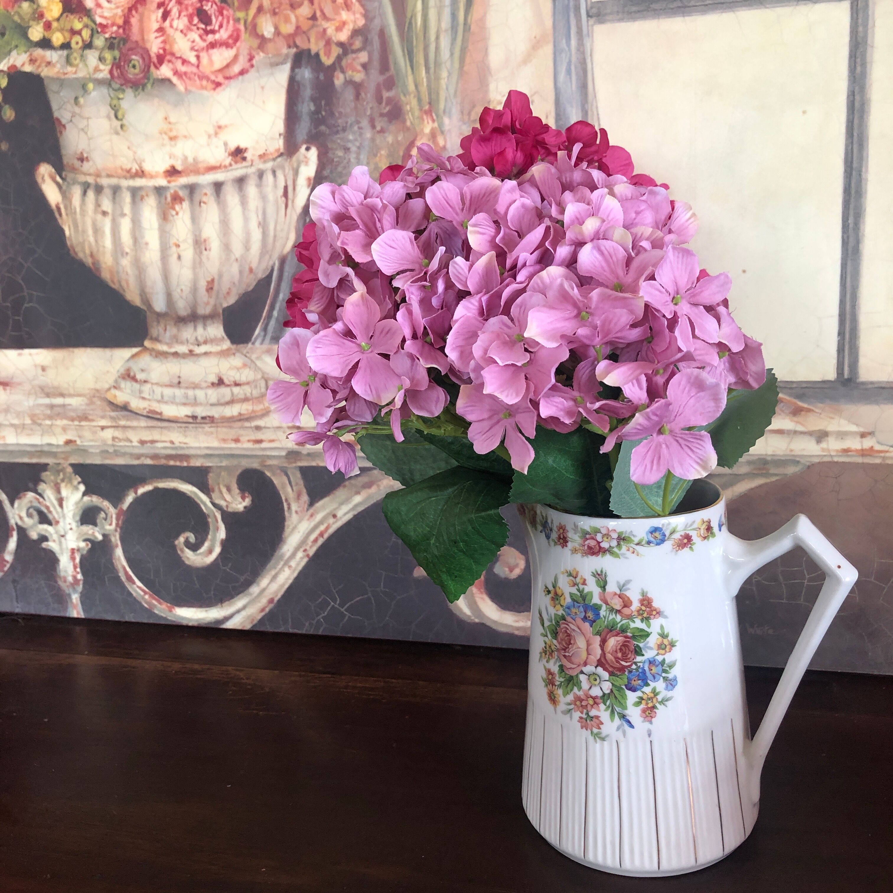 Porcelain pitcher with flowers