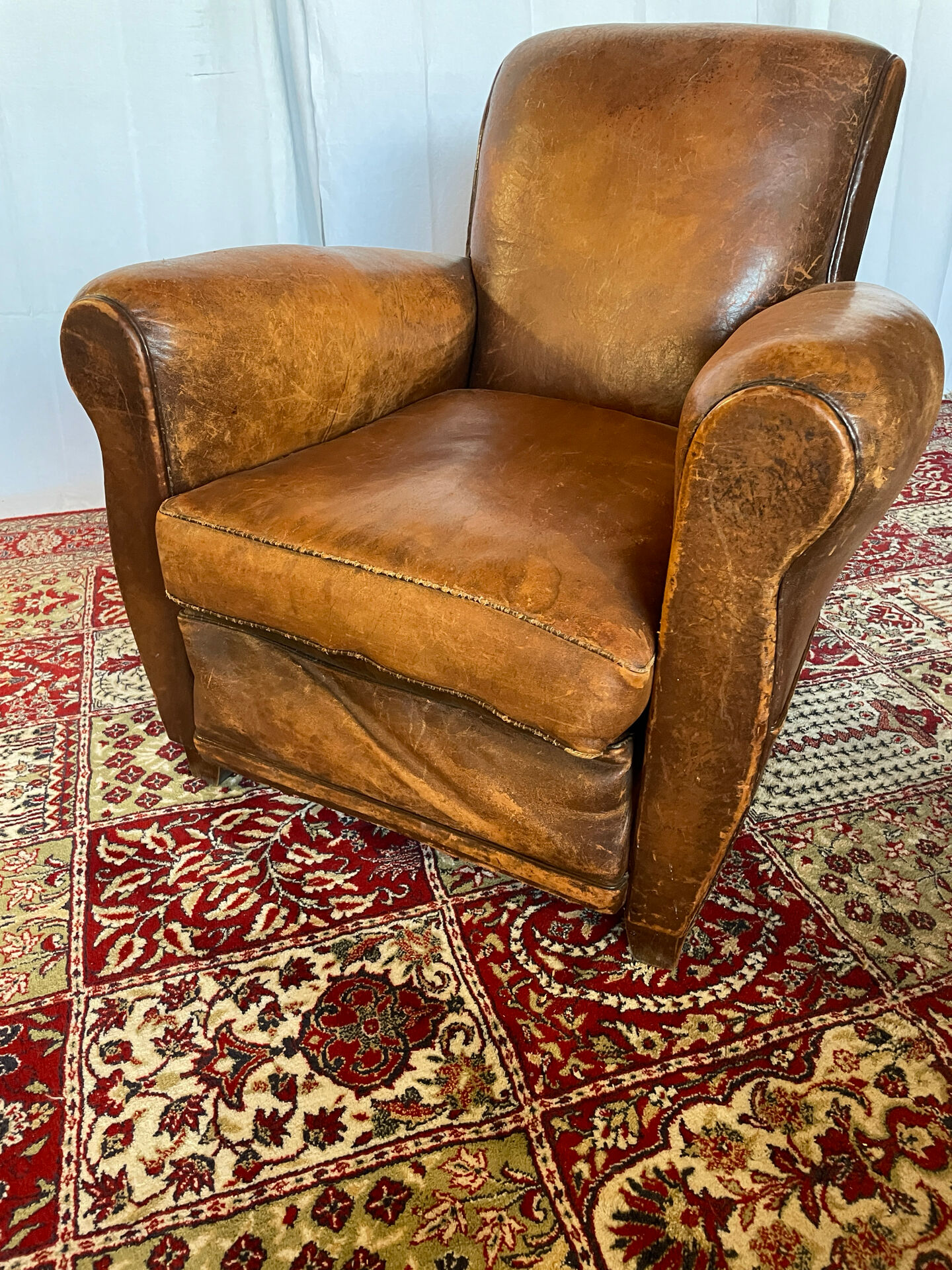 Vintage club armchair in cowhide leather