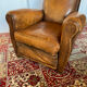 Vintage club armchair in cowhide leather