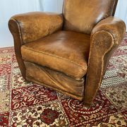 Vintage club armchair in cowhide leather