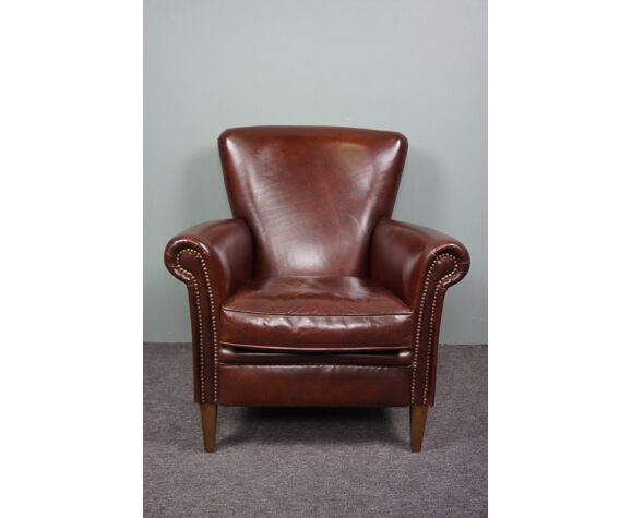 Brown sheep leather armchair