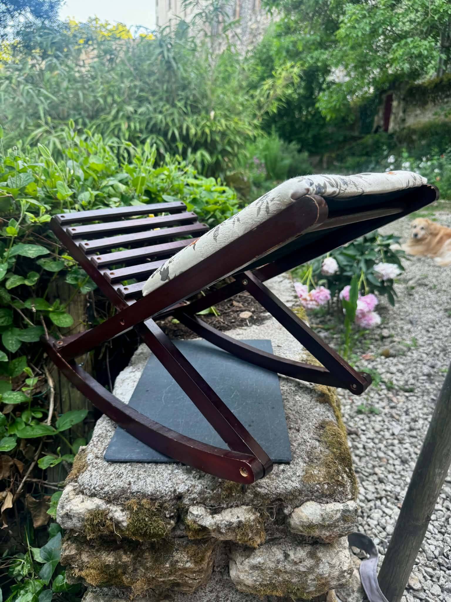 Folding footrest with vintage embroidery