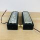 Pair of molded glass and metal wall lights from the 1950s