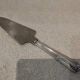 Silver-plated metal pie server with cutting handle, by the silversmith Ercuis Valencay