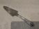 Silver-plated metal pie server with cutting handle, by the silversmith Ercuis Valencay