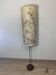 Floor lamp with a lampshade made of dried flowers