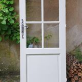 Old wooden door with small squares