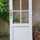Old wooden door with small squares