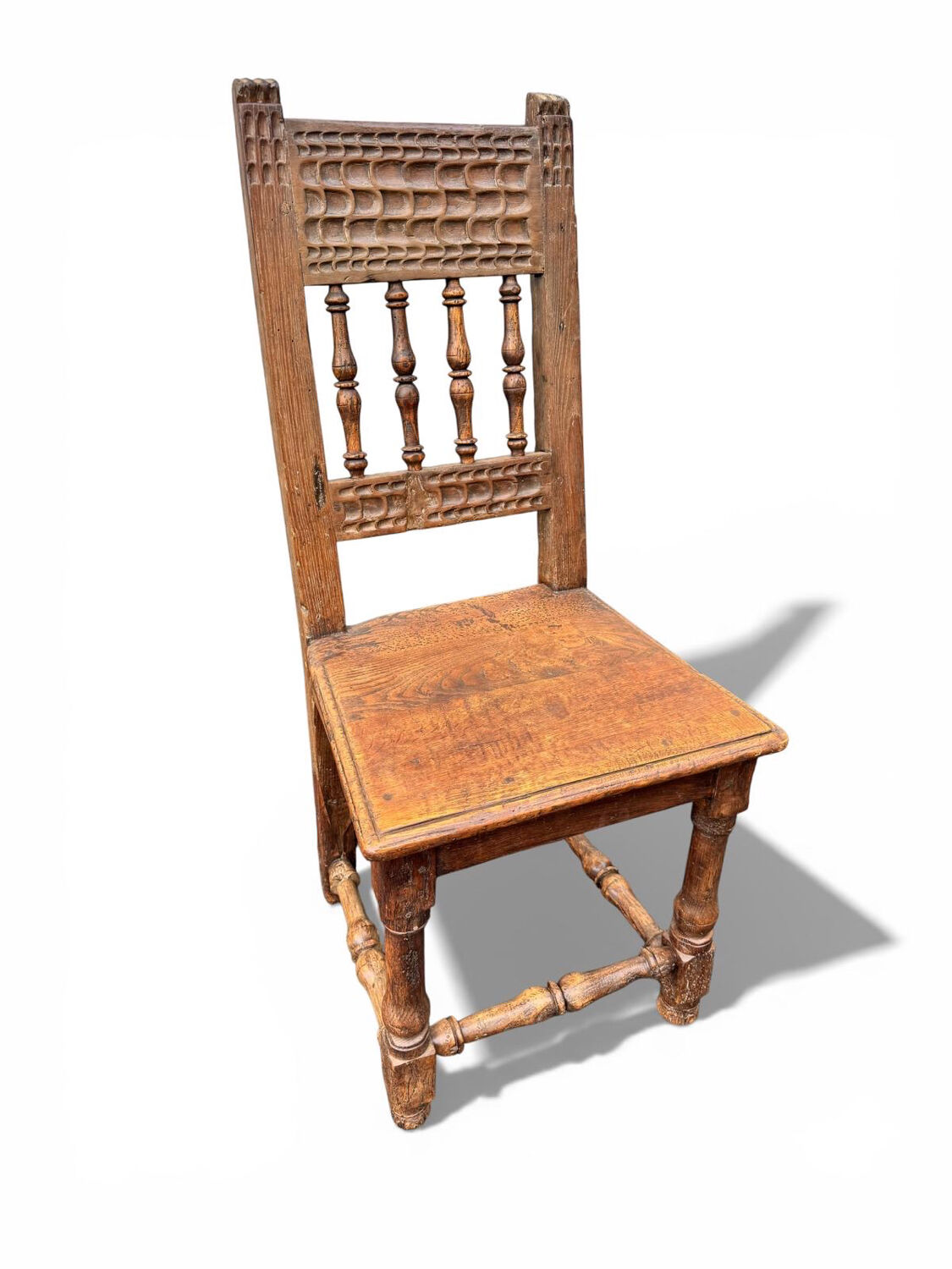 Rare high chair from the 16th/17th century in solid oak.