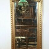 Mirror with an angel in gilded wood and stucco 166x61cm