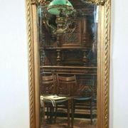 Miroir avec un ange en bois doré et stuc 166x61cm