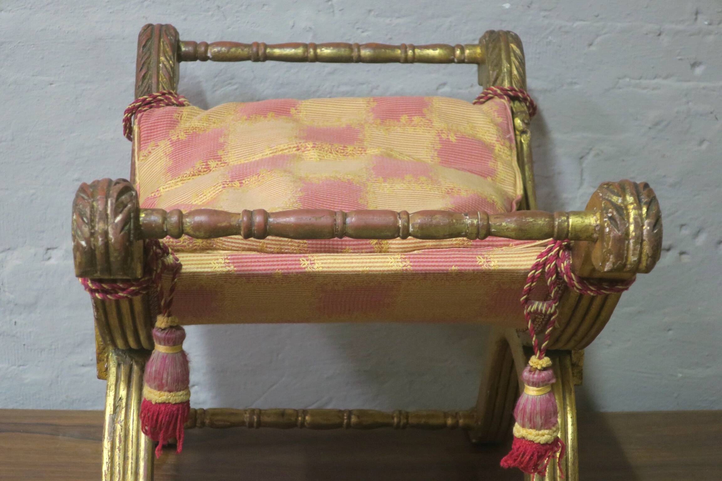 Antique parcel gilt cruciform stool