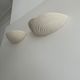 Pair of wall lamps in molded plaster France 1980
