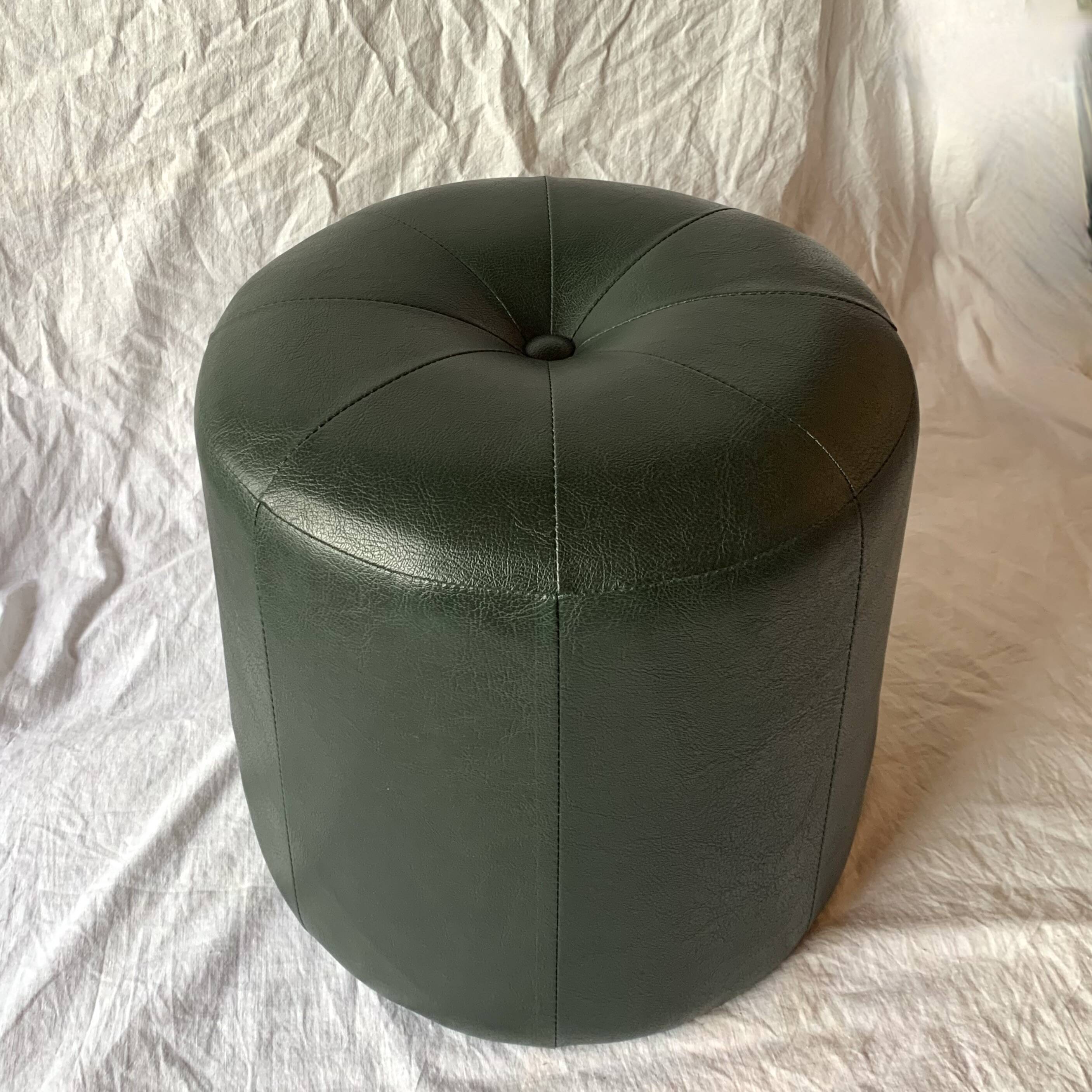 Pouf vintage rond en Skaï vert