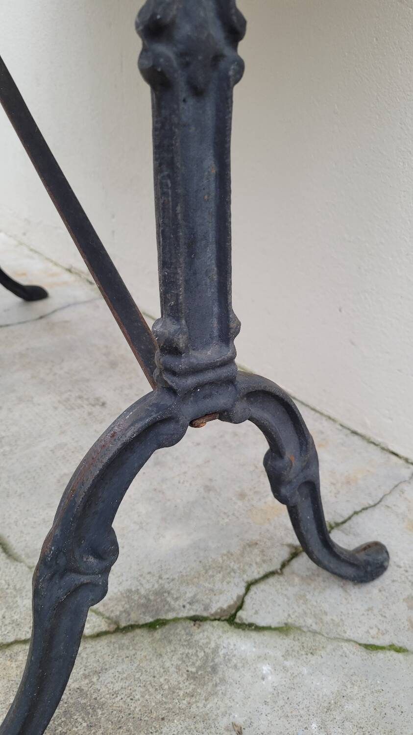 Antique cast iron bistro table with oval marble top