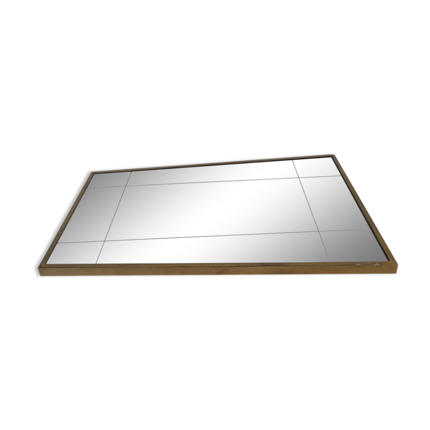 Mirror in a brass frame, dating back to the 1960s