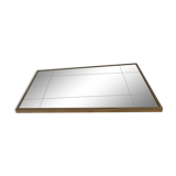 Mirror in a brass frame, dating back to the 1960s