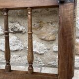 Old children's bed with retractable walnut bars