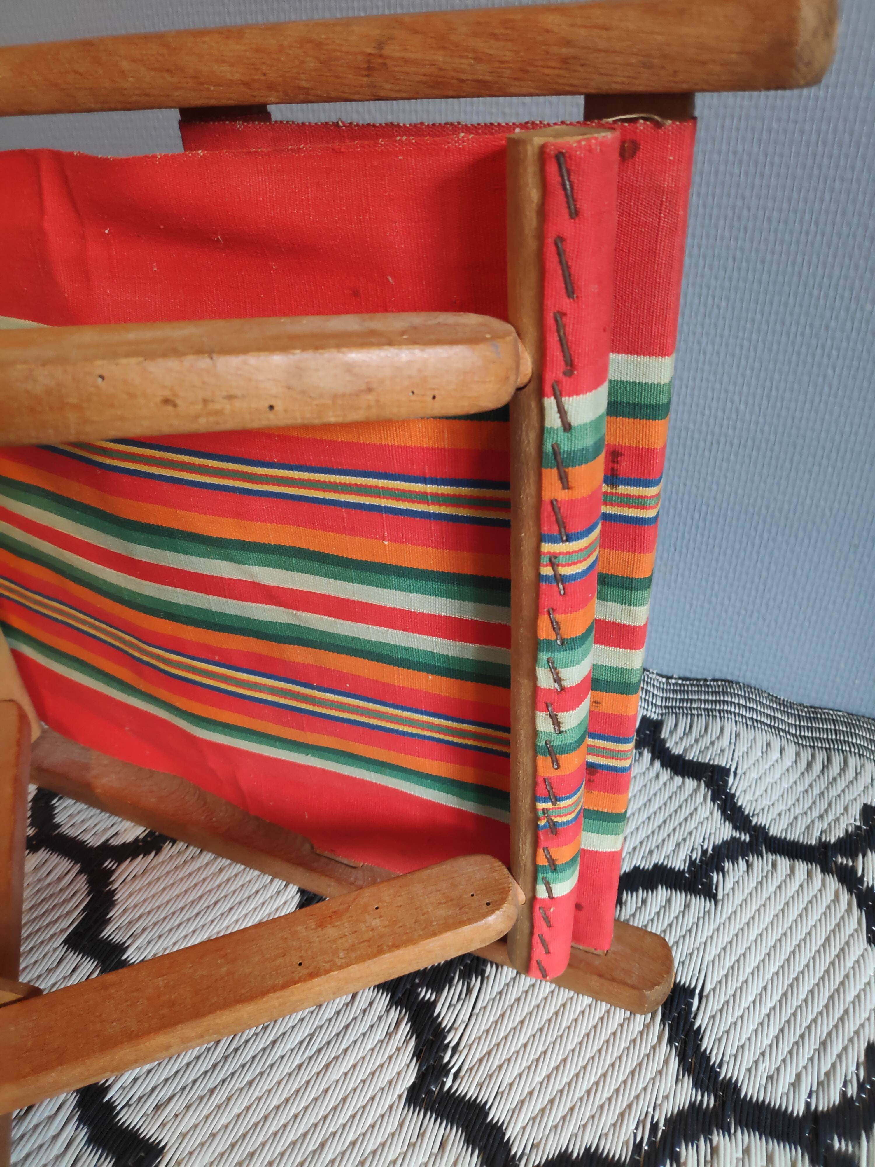 Vintage wooden folding chairs and basque fabric