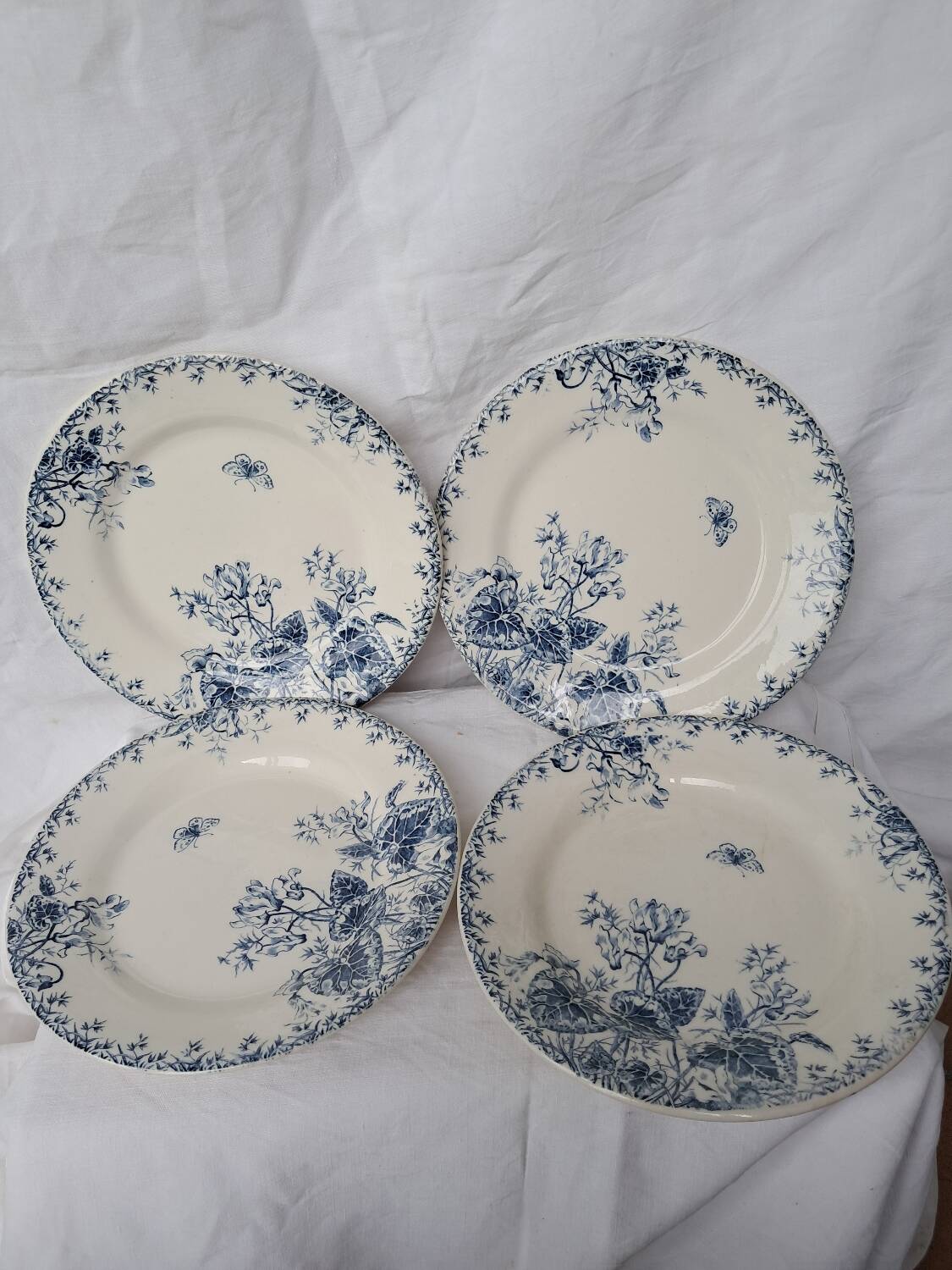Vintage plates with blue cyclamen pattern, Gien porcelain