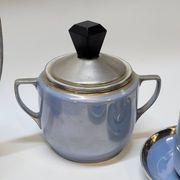 Art deco coffee service in fine iridescent blue porcelain, metal and wood